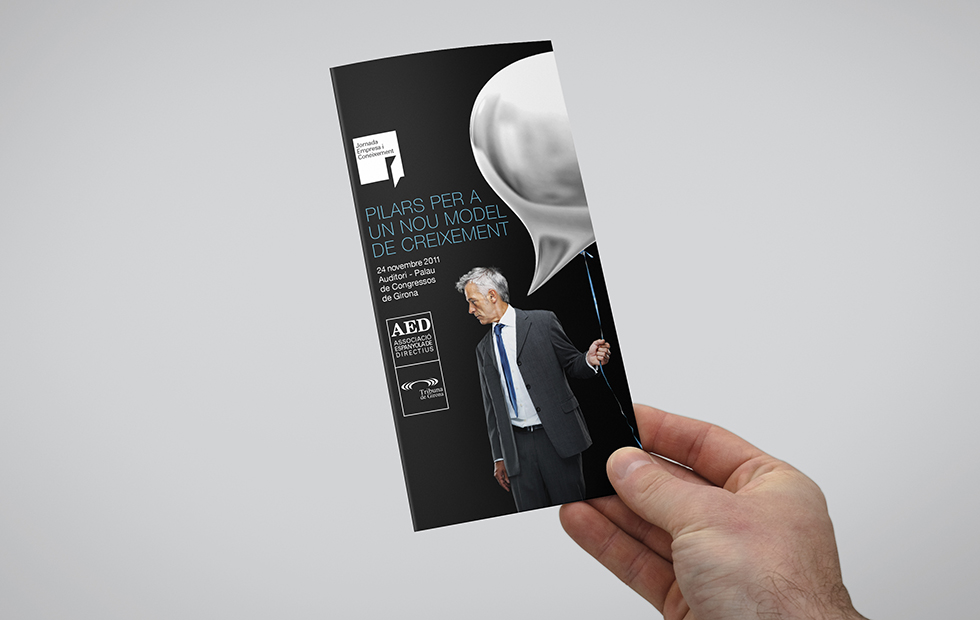 aed_brochure_hand_executive_black_workshops_graphicdesign